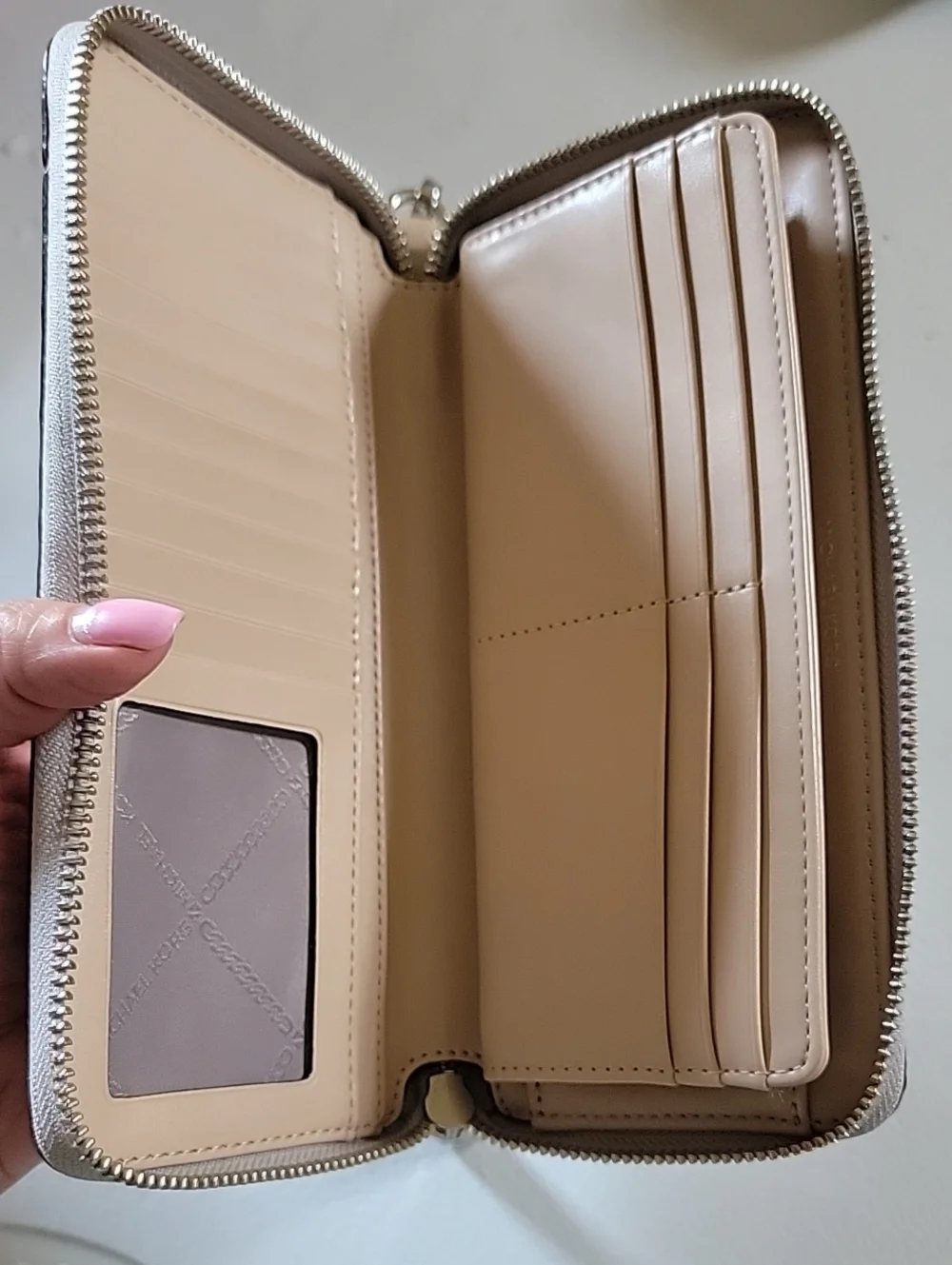 Michael Kors Jet Set Large Patent Logo Embossed Continental Wallet In Silver